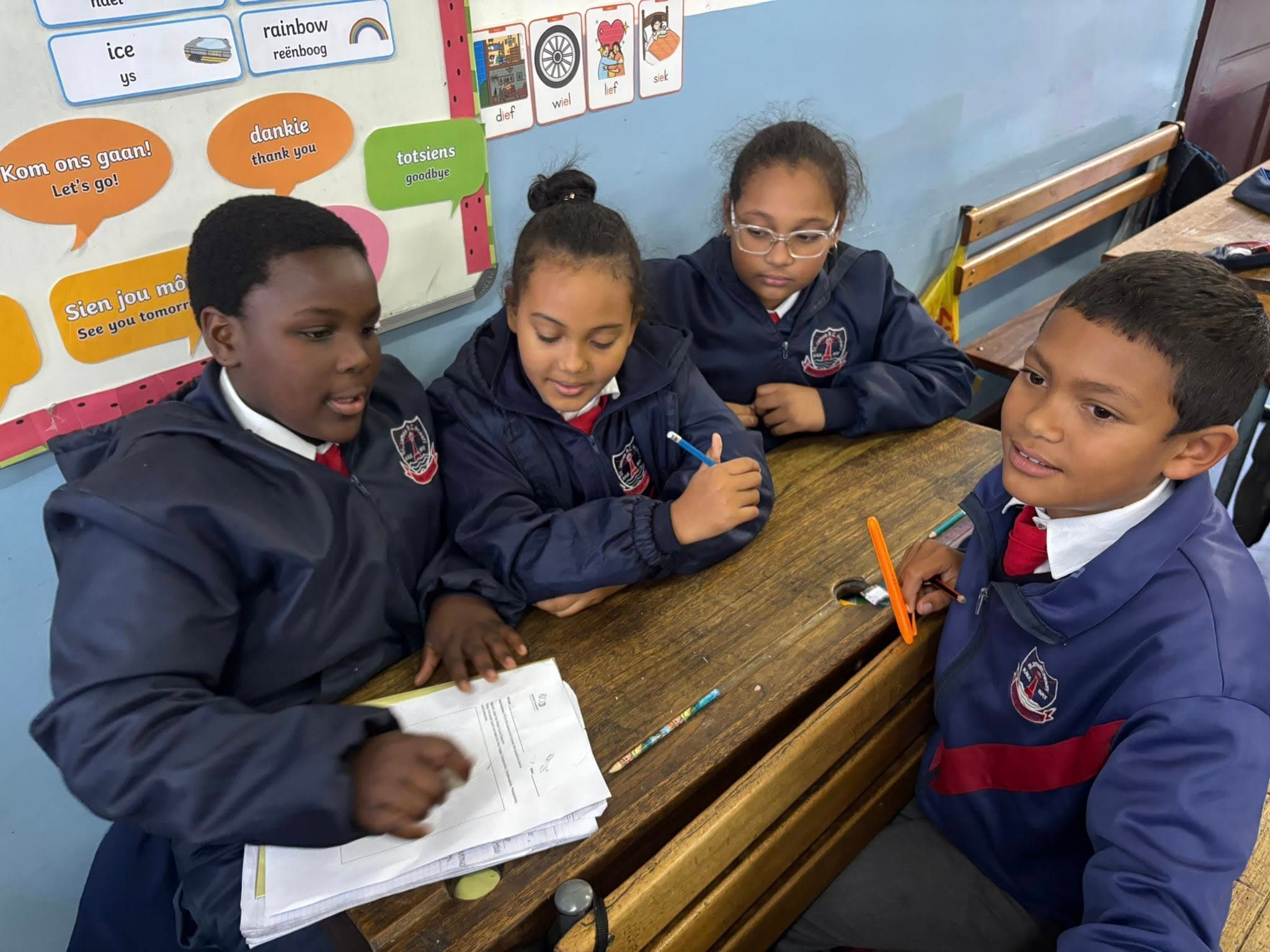 Students engaged in learning at St. James Primary